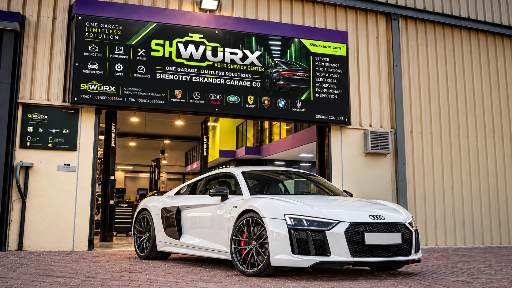 Audi outside the SHWURX-branded workshop facade
