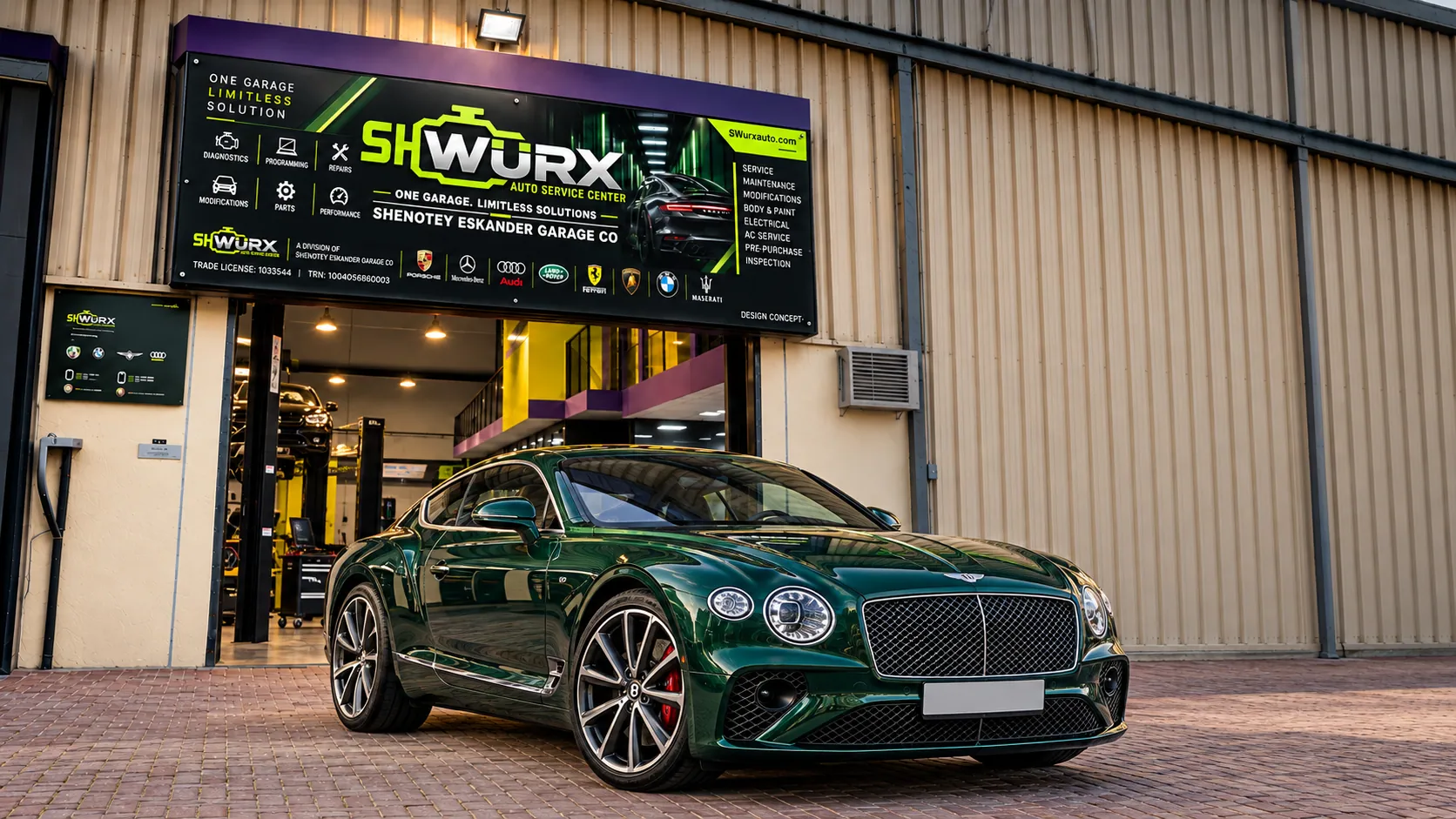 Bentley outside the SHWURX-branded workshop facade
