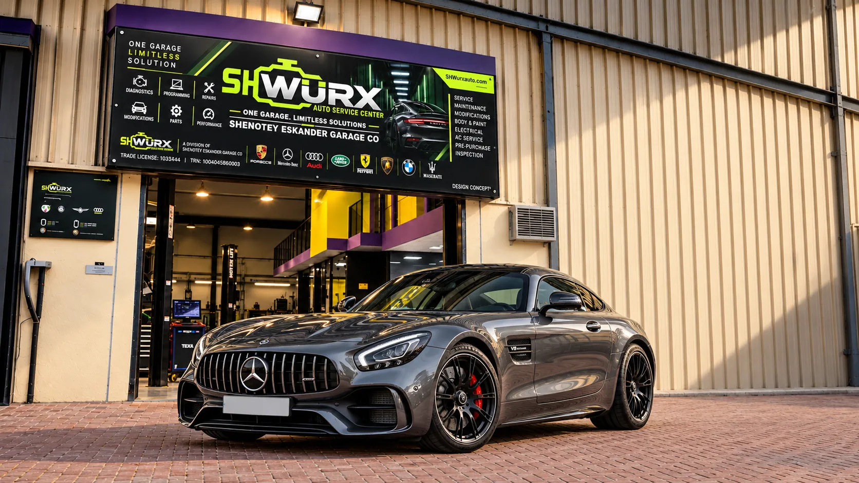 Mercedes Benz outside the SHWURX-branded workshop facade